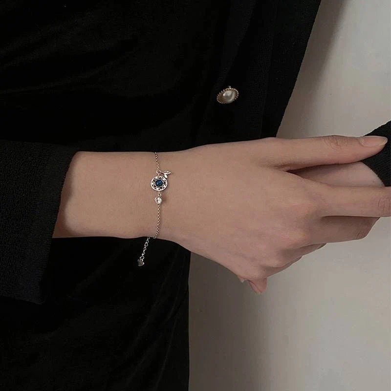 Enchanting sterling silver bracelet with genuine moonstone and celestial motifs