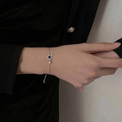 Enchanting sterling silver bracelet with genuine moonstone and celestial motifs