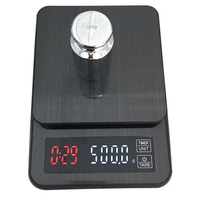 Premium digital coffee scale with LCD display, timer, and stainless steel platform for precise brewing control