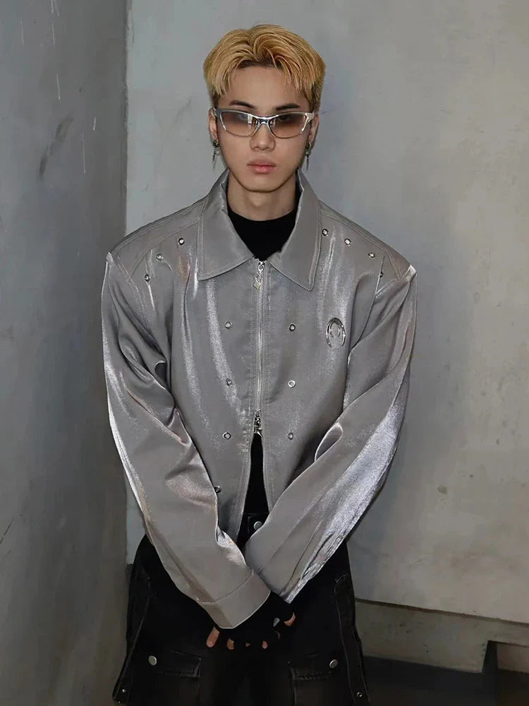 A stylish padded shoulder jacket in black and silver grey, featuring a structured silhouette and a comfortable, wrinkle-resistant design.