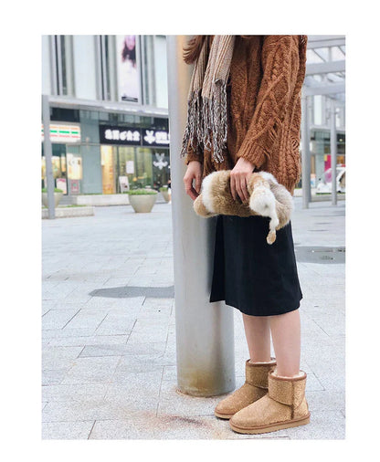 Premium rhinestone-embellished ankle boots for women, featuring a shimmering upper and durable rubber sole for winter wear