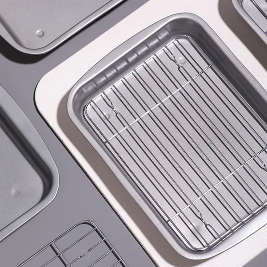 Premium non-stick oven grilled fish tray with elevated frame, ideal for cooking a variety of proteins to perfection