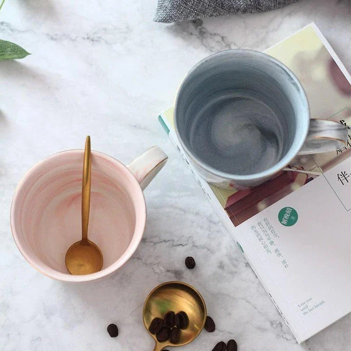 Elegant marble-inspired porcelain coffee mug with a sleek and sophisticated British design