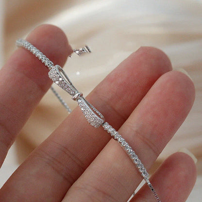 Elegant 925 sterling silver bow bracelet with minimalist design for stylish women