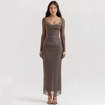 Elegant sheer long sleeve maxi dress in black, featuring a flattering H-profile silhouette and full-length design for a sophisticated evening look.
