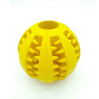 Premium natural rubber interactive ball for dogs in various colours, designed to provide mental stimulation and physical exercise.