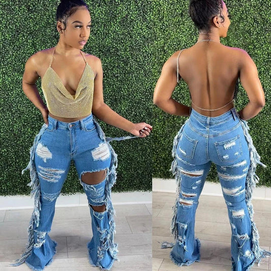 Stylishly distressed tassel jeans with light blue wash and straight-leg silhouette
