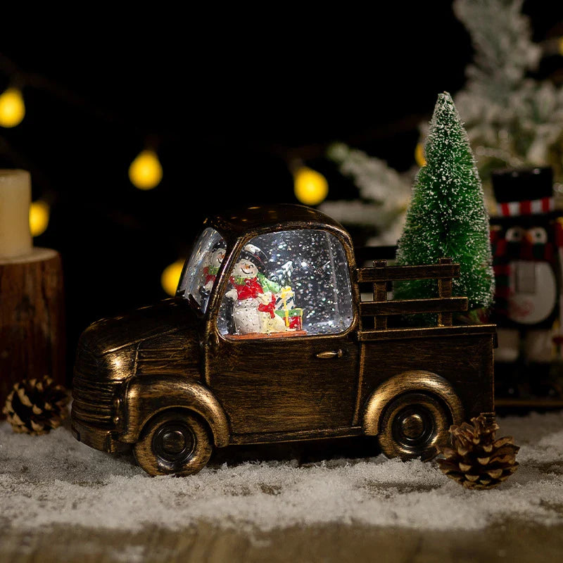 A festive car-mounted crystal ball ornament with a bronze snowman design, playing classic Christmas music.