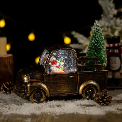 A festive car-mounted crystal ball ornament with a bronze snowman design, playing classic Christmas music.