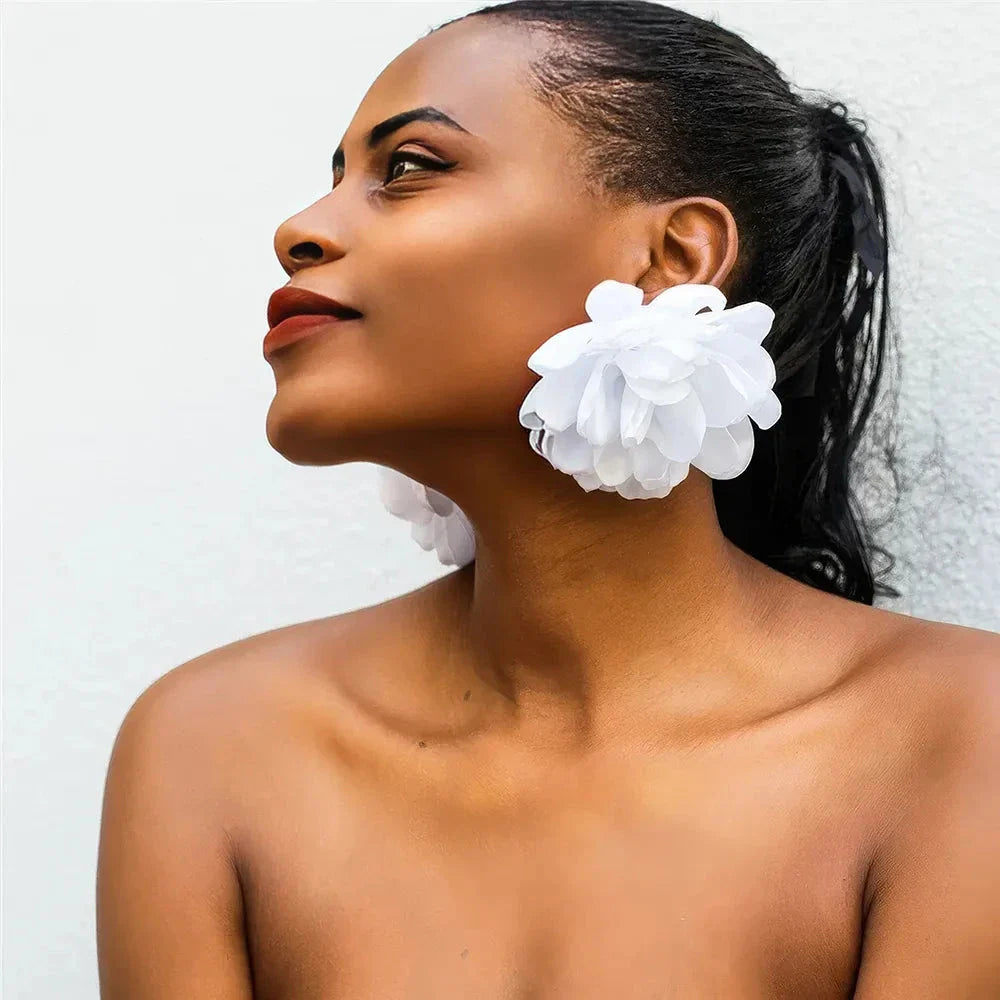 Exquisite fluffy fabric flower stud earrings in a black metal colour, featuring oversized fabric blooms for a unique and elegant design.