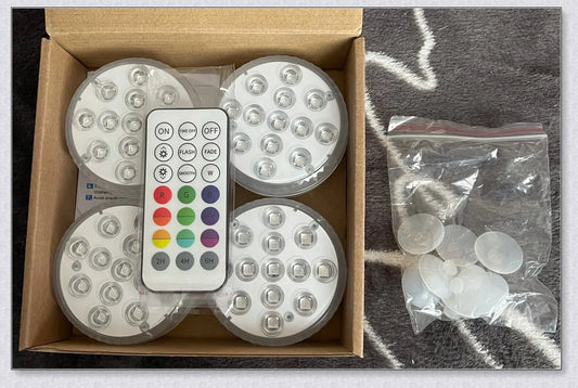 Submersible colour-changing LED pool lights with magnetic and suction cup mounting for easy installation