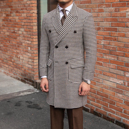 Double-breasted thick houndstooth coat in a vintage-inspired design, featuring a premium wool-rich fabric and a refined silhouette