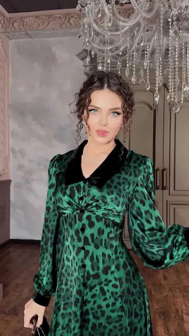 A stylish leopard print dress with a waist-trimming design, perfect for adding a touch of feline fierceness to your wardrobe.