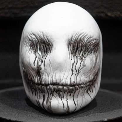 A high-quality latex ghost mask with a chilling and realistic appearance, perfect for Halloween and masquerade parties.