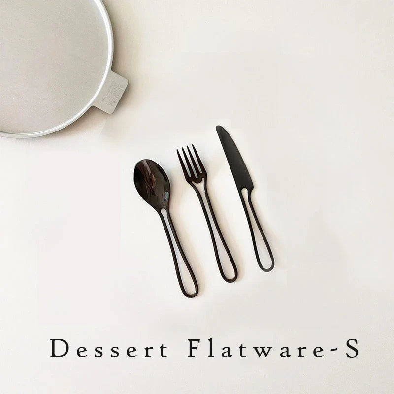 Sophisticated 304 stainless steel cutlery set with sleek black finish for elegant dining in the UK