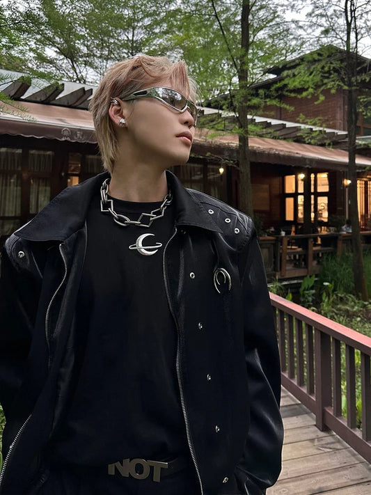 A stylish padded shoulder jacket in black and silver grey, featuring a structured silhouette and a comfortable, wrinkle-resistant design.