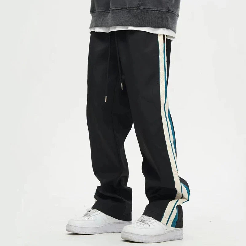 Relaxed fit straight leg trousers in black and dark blue colours, perfect for the modern gentleman's casual wardrobe