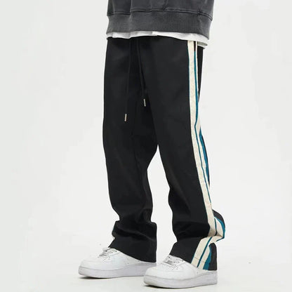 Relaxed fit straight leg trousers in black and dark blue colours, perfect for the modern gentleman's casual wardrobe