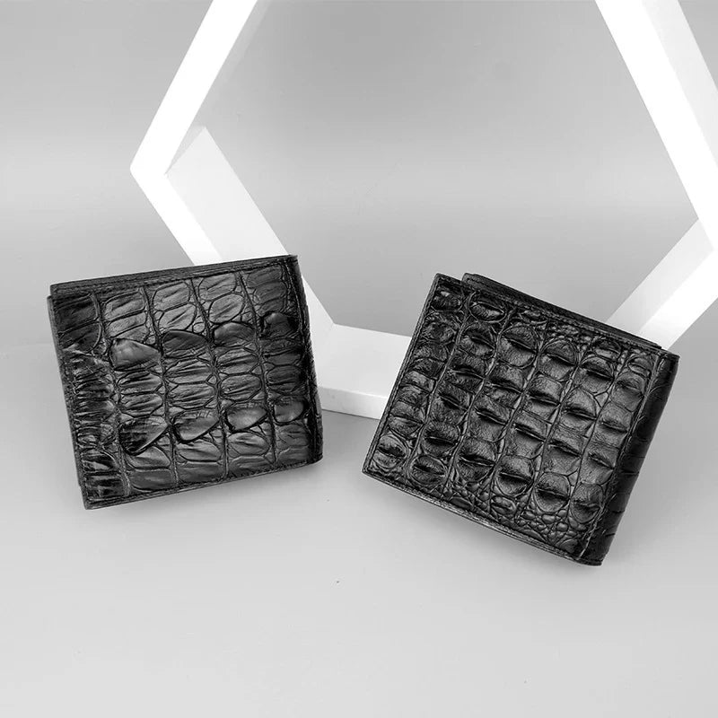 Sophisticated men's leather wallet in black, made from premium crocodile skin for a refined and durable everyday accessory