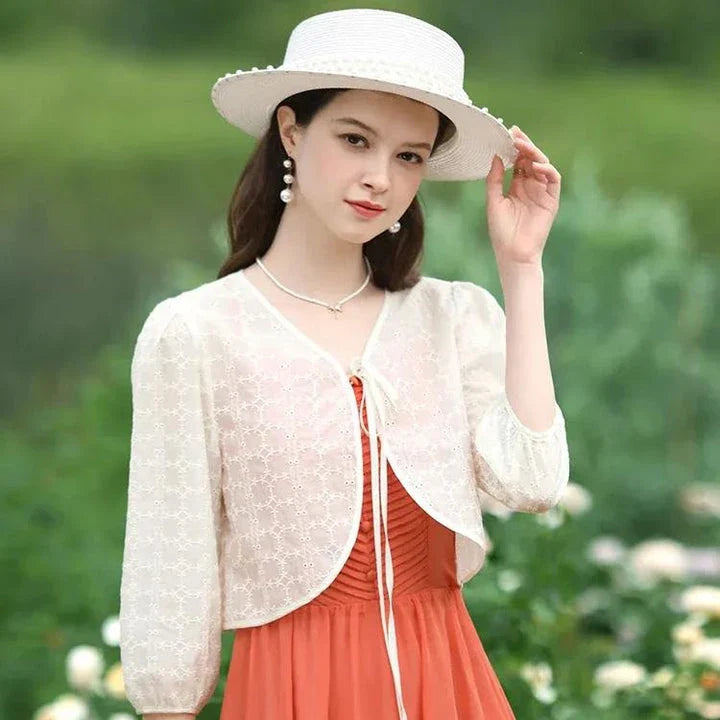 Elegant Summer Lace Jacket for Women - Vintage-inspired style with floral and lace design, puff sleeves, and wide-waisted cut for a flattering silhouette.