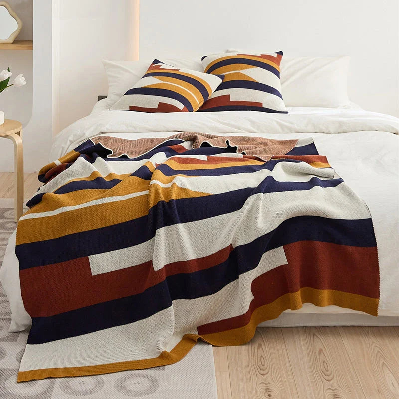 Cosy Bohemian striped throw blanket and cushion cover made from premium 100% cotton, featuring a vibrant jacquard-style pattern