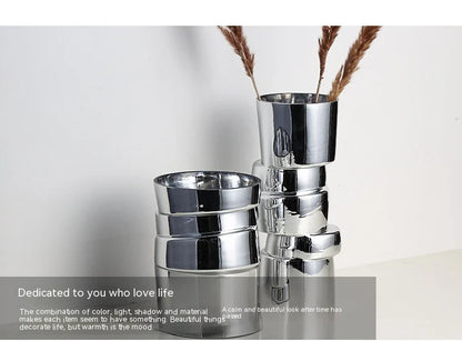 Electroplated silver glass vase with a modern, geometric design for home decor