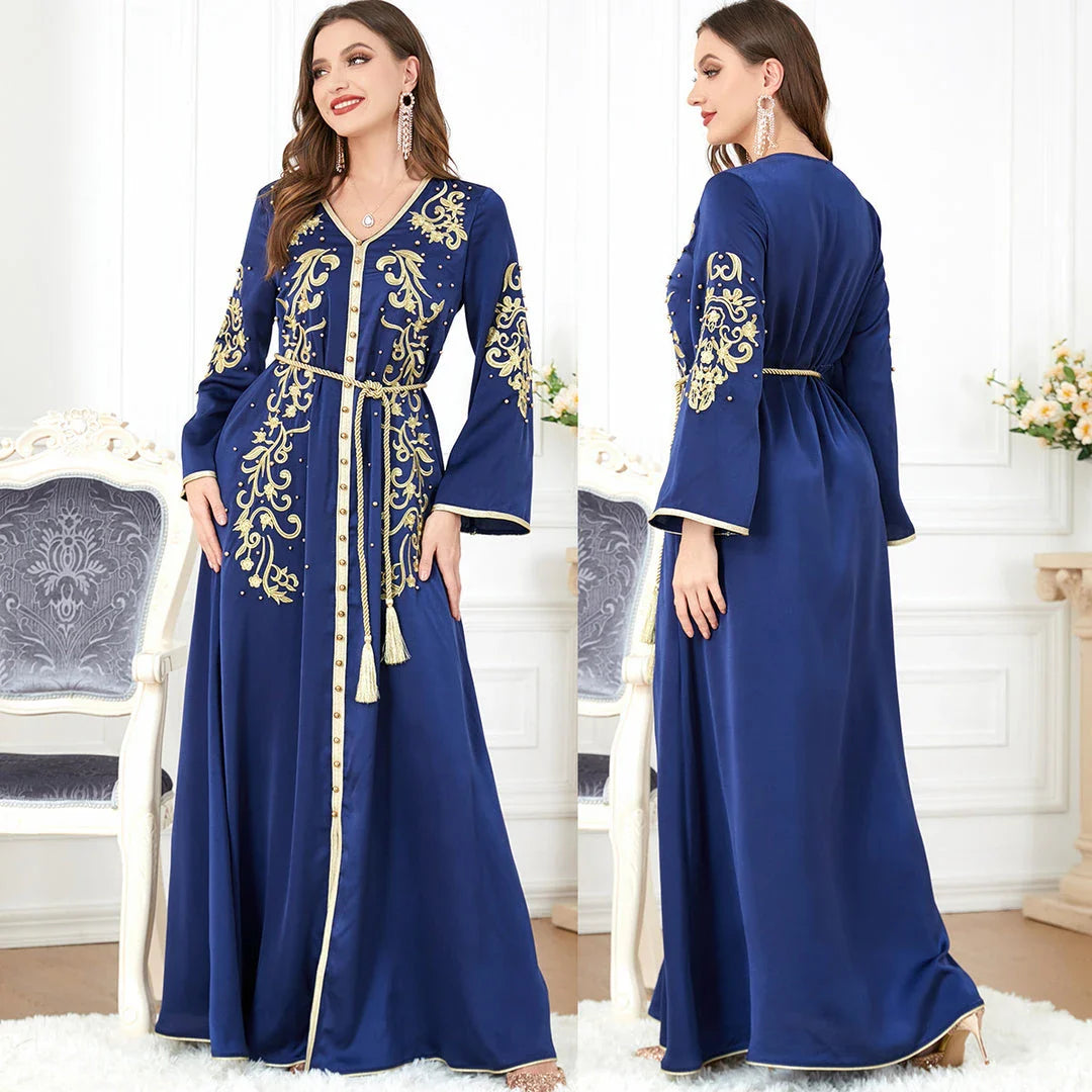 Elegant long-sleeve dress with floral embroidery in a sophisticated sapphire blue colour, suitable for British women