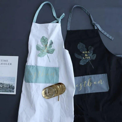 Premium cotton barista apron with a beautiful coconut leaf print design, perfect for coffee shop staff