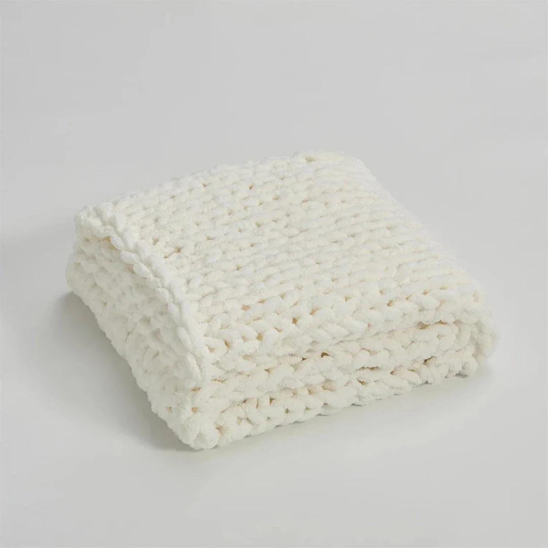 Elegant Chenille Chunky Knit Throw Blanket in White, available in adult and child sizes, offering cosy comfort and timeless style for your home