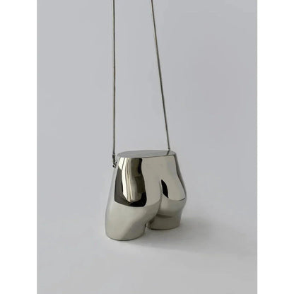 Elegant silver acrylic evening clutch bag with stylish chain strap for versatile carrying