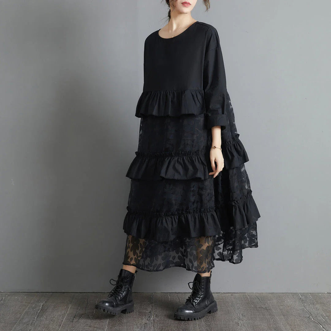 Plus size black lace dress with long sleeves and a loose, relaxed fit for a timeless and sophisticated look