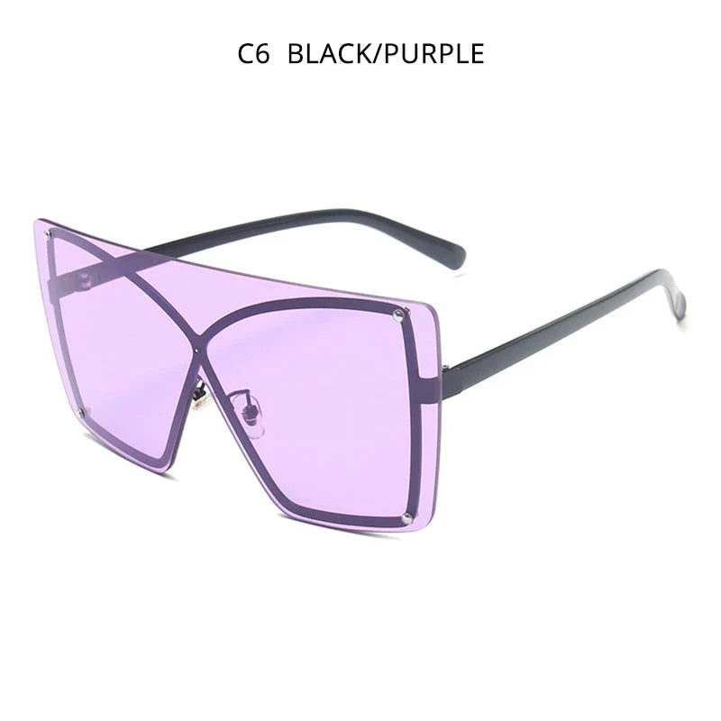 Fashionable oversized flat top sunglasses with gradient lenses and a sleek, rimless plastic frame