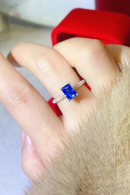 Elegant 1 Carat Moissanite Sterling Silver Ring in a beautiful blue hue, showcasing a minimalist design and premium construction.