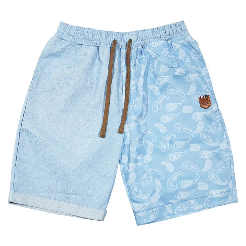 Relaxed-fit sports shorts in light blue and denim blue mosaic patterns, designed for casual everyday wear