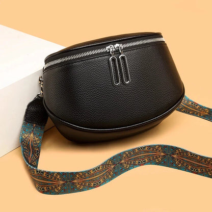 Premium genuine leather tote bag with adjustable strap and interior compartments for fashion-forward women