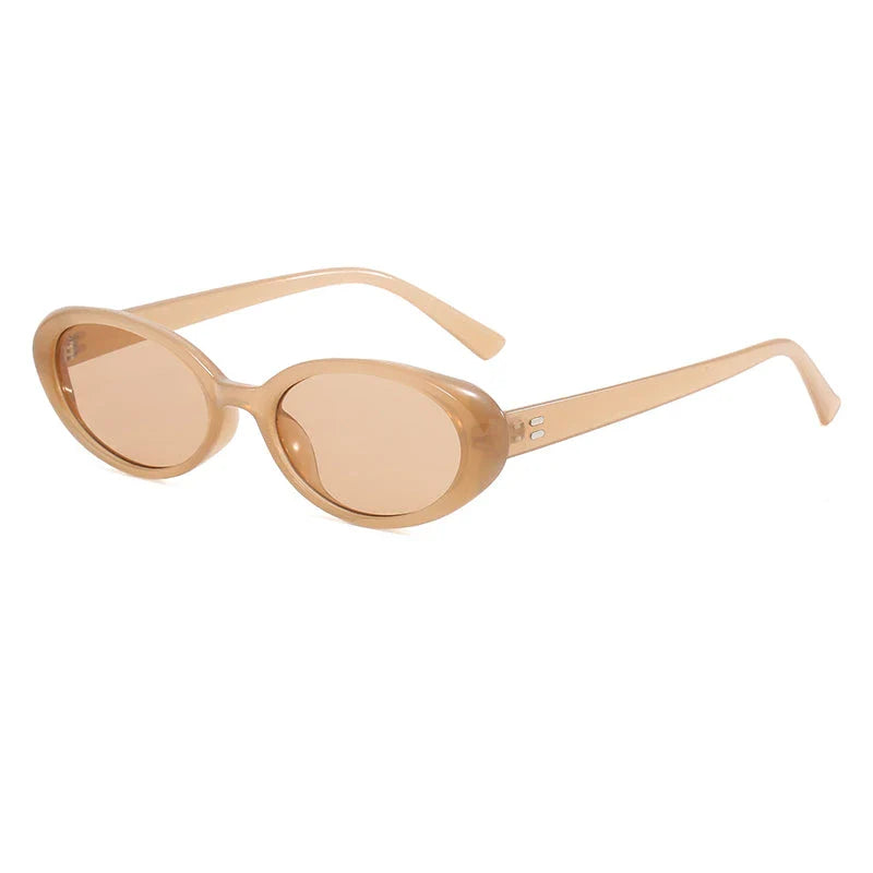 Oval-shaped women's sunglasses in a white and grey colour, offering UV protection and a stylish, retro-inspired design.