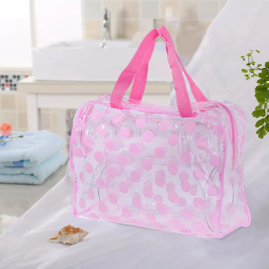 Stylish and durable PVC transparent makeup bag with fashionable dot pattern, perfect for British travellers