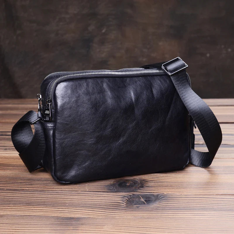 Handmade premium leather shoulder bag for men, featuring a cross-body design and retro-inspired style