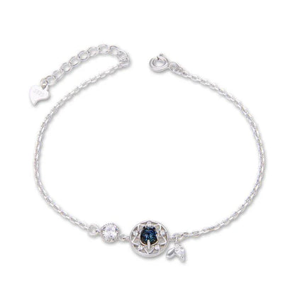 Enchanting sterling silver bracelet with genuine moonstone and celestial motifs