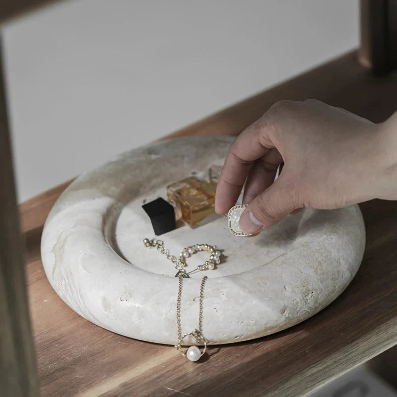 Elegant travertine serving tray with a smooth, round design and neutral beige colour for versatile home decor use