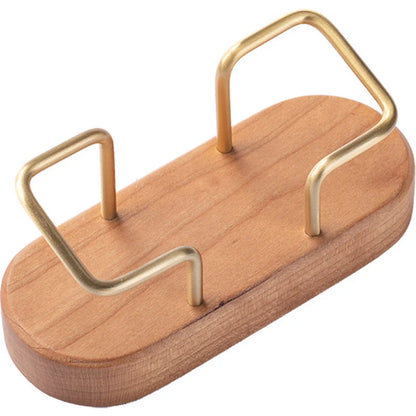 Elegant wooden business card holder made of premium black walnut or beech wood, designed for use on office desks and in home workspaces.