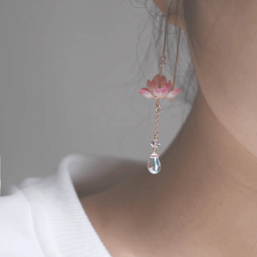 Elegant sterling silver ear clip with a lotus flower design, inspired by traditional Hanfu fashion