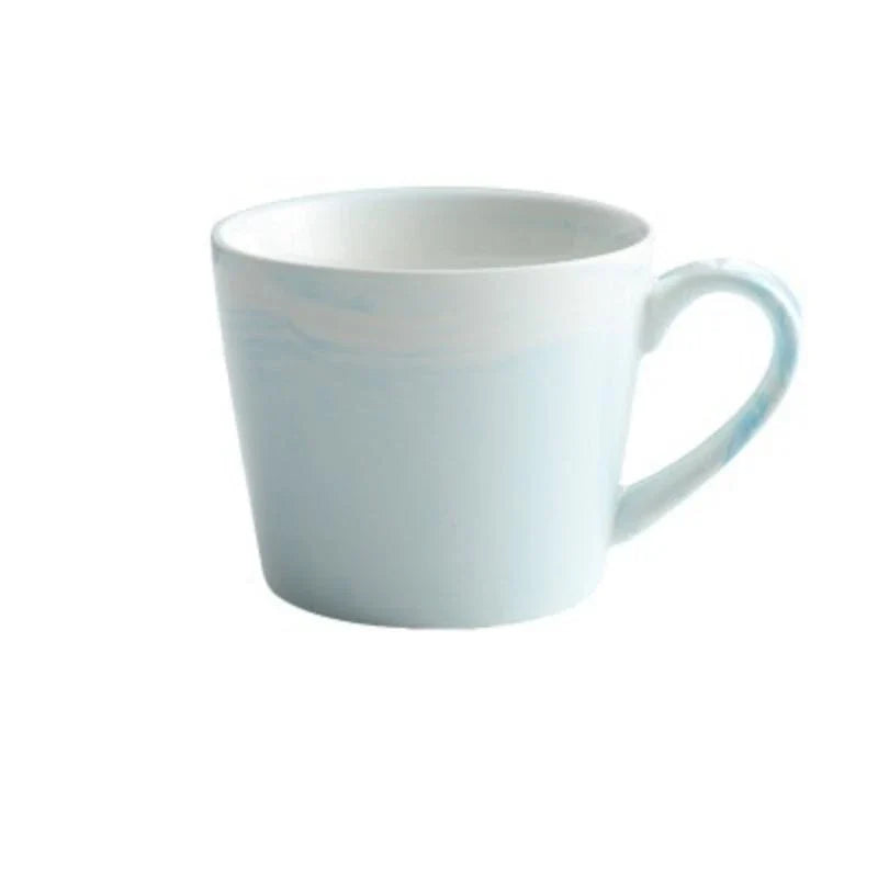 Elegant marble-inspired porcelain coffee mug with a sleek and sophisticated British design