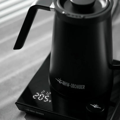Sleek stainless steel electric gooseneck kettle with precise temperature control for perfect coffee brewing