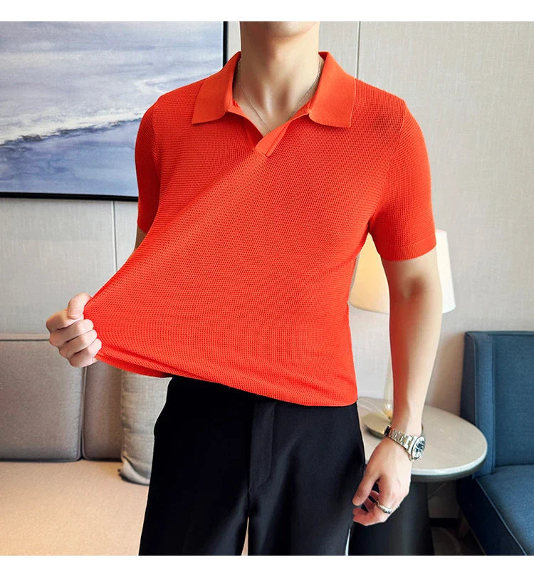 A premium cotton blend polo shirt in classic colours, featuring a v-neck lapel collar and slim fit design for a sophisticated casual look.