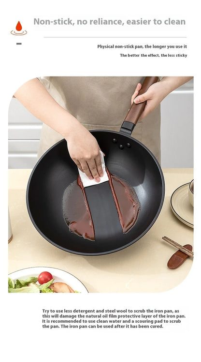 Premium quality refined iron wok with sleek, modern design for versatile cooking tasks