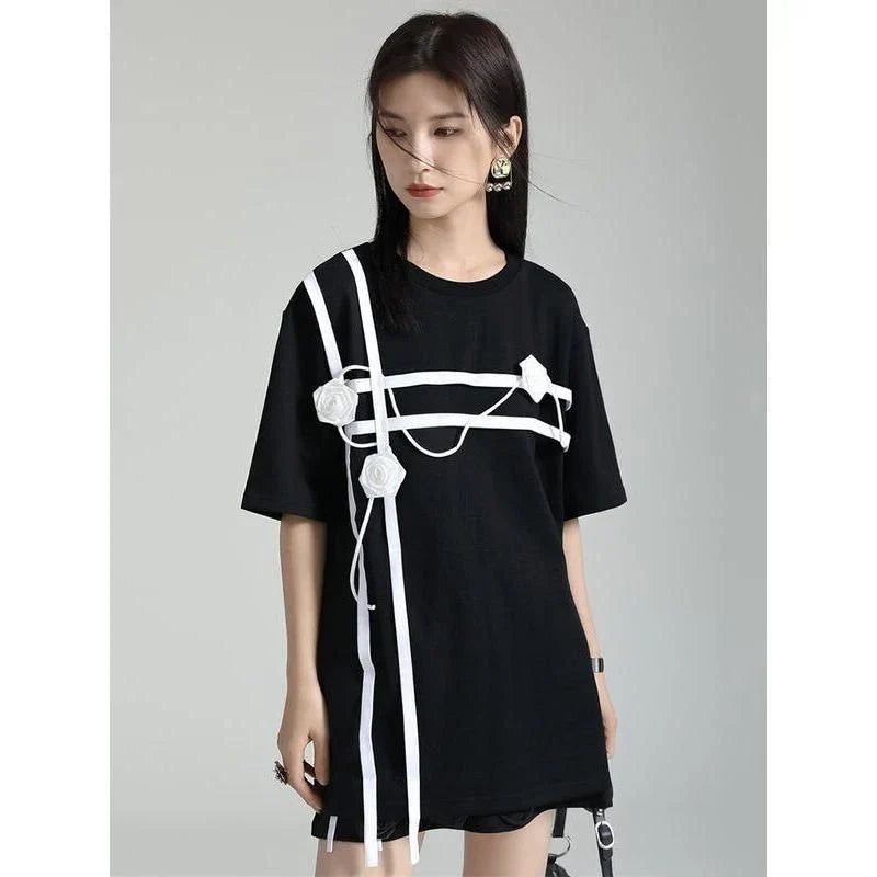 A stylish black and white floral half-sleeve casual t-shirt with a classic round neckline, perfect for everyday wear.