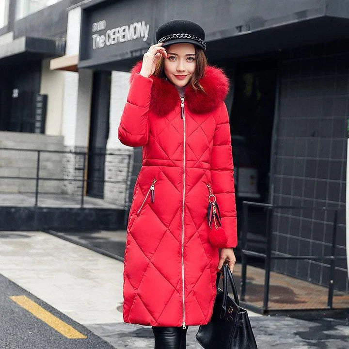 A premium padded down coat for women with a detachable hood, designed to provide warmth and style during the winter.
