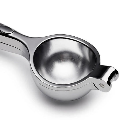 A high-quality manual lemon squeezer made of stainless steel for extracting fresh citrus juice