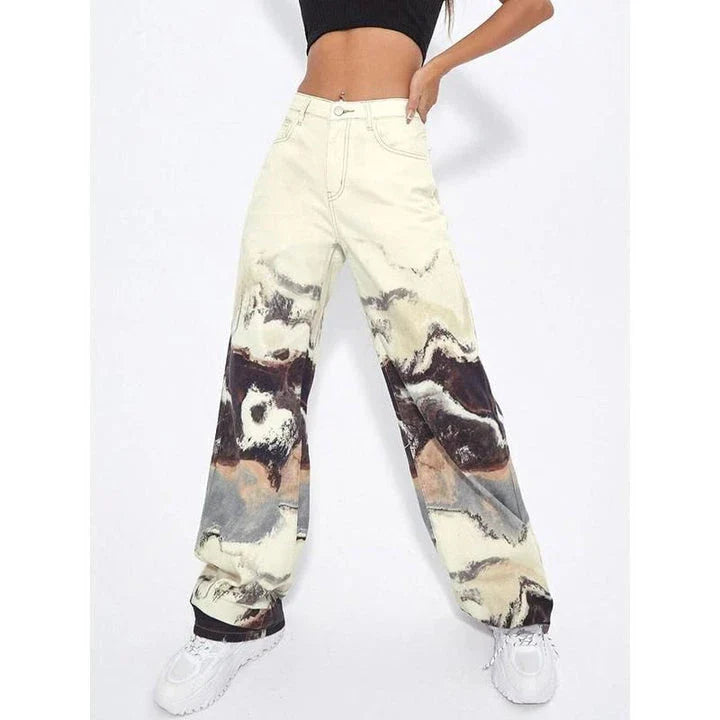 Stylish tie-dye wide-leg high-waist jeans in various sizes, featuring a unique colorblock design and premium denim fabric.